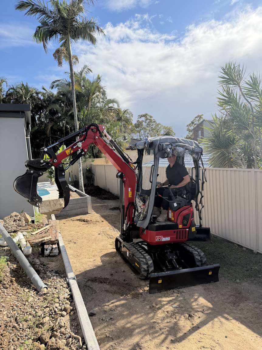 Alex operating the excavator on site